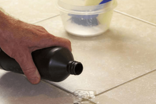 Hydrogen peroxide with baking soda for tile and grout cleaning