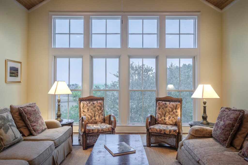 A bright and airy living room with clean windows, allowing natural light to illuminate the space, enhancing the overall attractiveness of the home for potential buyers in West Chester