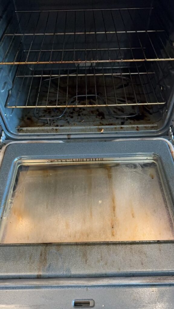 Dirty stove covered in grease and grime